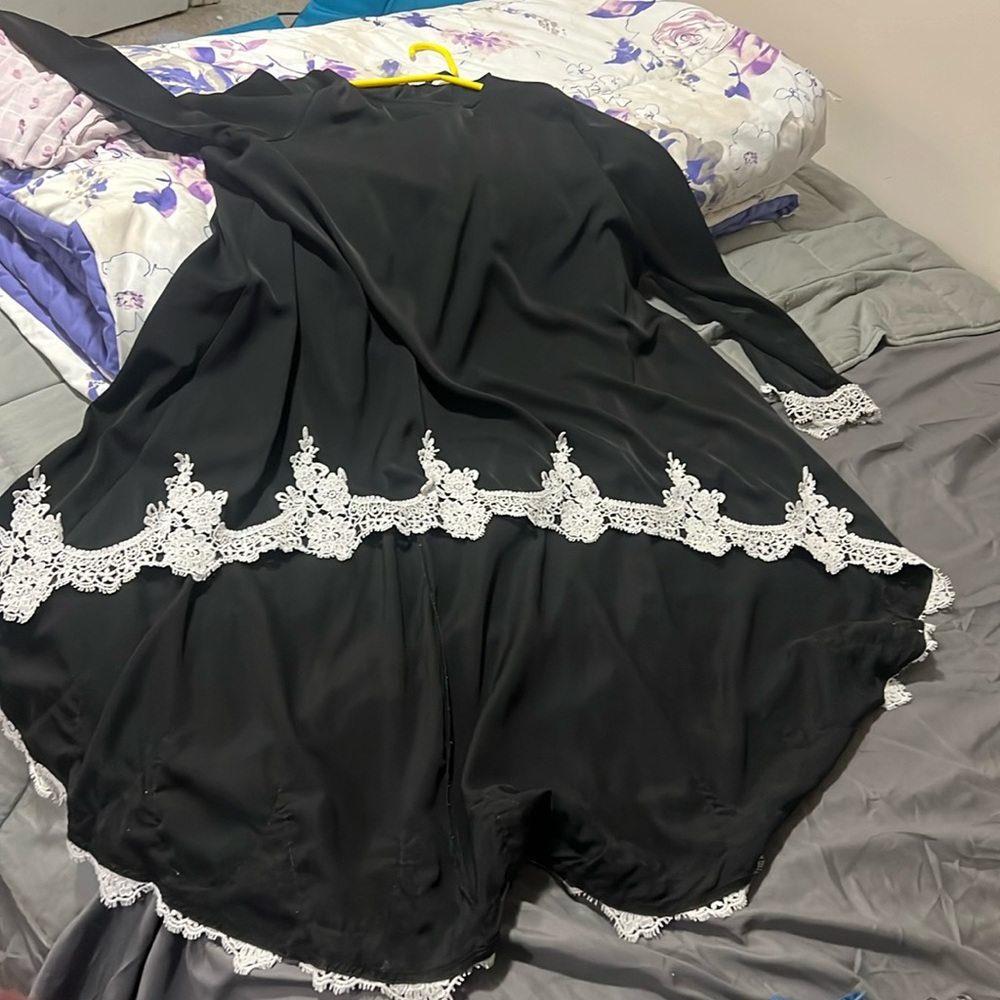 This SHEIN (L/XL) more likely a S/M black A-Line dress is up for sale, mild use.